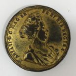 A 1694 GILT MEDALLION. A gilt washed Maria II commemorative medallion. Obverse with bust facing