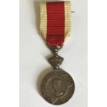 AN ABYSSINIAN WAR MINIATURE MEDAL. A Victorian Abyssinian War miniature medal, mounted with a top