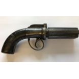A PEPPER BOX TYPE REVOLVER. An English Six Barel Pepper Box type revolver with a rotating 8cm barrel