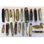 AN ASSORTMENT OF TWENTY FOLDING KNIVES. Twenty assorted knives including a knife in the shape of a