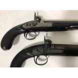 A FINE PAIR OF OFFICERS PISTOLS BY E & W BOND. A pair of mid-19th century Officers Pistols with