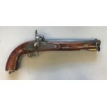 A REPRODUCTION MILITARY STYLE PERCUSSION CAP PISTOL. A reproduction military style pistol with a