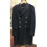 A MILITARY OVERCOAT. A grey military double-breasted overcoat six gilt buttons decorated with