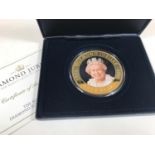 A COLLECTION OF COMMEMORATIVE PICTORIAL CROWN SIZED COINS. A collection of thirty one pictorial gilt