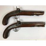 A PAIR OF PERCUSSION CAP PISTOLS BY OXBORROW OF WOODBRIDGE. A pair of percussion cap back action