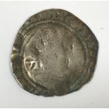 A JAMES I HAMMERED SIXPENCE. A hammered sixpence dated 1606, mm possibly escallop.