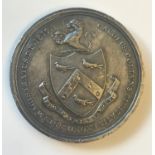 A 19th CENTURY EXETER SCHOOL 'COLLYNS' MEDAl. A Collyns medal from Exeter School 1819-1865. The