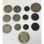 A SMALL COLLECTION OF PRE DECIMAL COINS INCLUDING AN 1887 FLORIN. Crowns for 1935 and 1937, Half