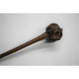 FIJIAN ULA TRIBAL THROWING CLUB with a natural root head, the shaft with incised decoration
