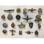 A COLLECTION OF MILITARY SWEETHEART BROOCHES AND UNIFORM BADGES. A collection of 61 assorted