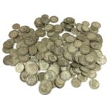 A COLLECTION OF PART SILVER SHILLINGS AND SIXPENCE PIECES. 85 Shillings between 1915 and 1945 and 98