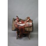 AMERICAN WESTERN SADDLE a high quality leather Western saddle, stamped Custom Leather RC, USA &