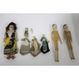 19THC MINIATURE WOODEN DOLLS 3 miniature wooden dolls with painted hair and facial features (limbs