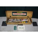 JAQUES BOXED CROQUET SET a pine box with wooden mallets, various croquet balls, hoops, instruction