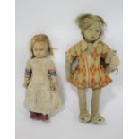 ANTIQUE DOLLS possibly by Kathe Kruse, including a large doll with a check coloured outfit and