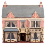 ANTIQUE DOLLS HOUSE a 2 storey house with large glazed windows and brick facade, the interior with