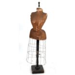 VINTAGE TAILORS DUMMY a wasp waist skirted tailors dummy or mannequin, mounted on a wooden stand and