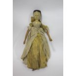 LARGE 19THC WOODEN DOLL a large peg jointed wooden doll with articulated limbs and probably with its