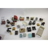 DOLLS HOUSE ACCESSORIES a mixed group of varying ages, including miniature prams, fireplaces, a