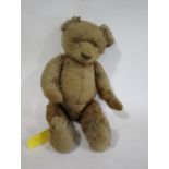 VINTAGE TEDDY BEAR a large vintage Bear with the remains of a cinnamon coloured mohair body, with