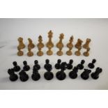 WOODEN CHESS SET a boxwood and ebony chess set, not weighted, King 9cms high. Also with some