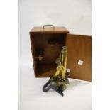 CASED MICROSCOPE & SLIDES - HENRY CROUCH a brass and metal monocular microscope, stamped Henry