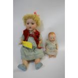 ARMAND MARSEILLE DOLL - 995 a large doll with weighted blue eyes and open mouth (one leg