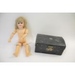 SCHOENAU & HOFFMEISTER DOLL & DOLLS TRUNK with weighted blue eyes, open mouth and pierced ears. With