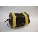 ANTIQUE ROSEWOOD CONCERTINA a 20 button concertina with rosewood ends, the side of each end with