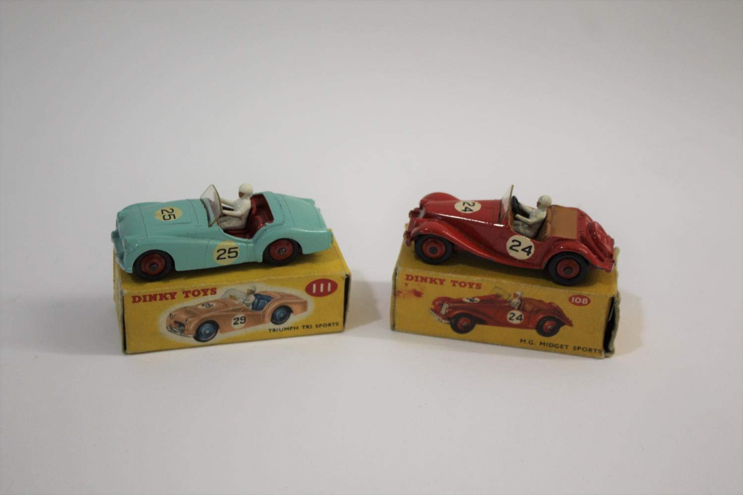 DINKY TOYS including a boxed 111 Triumph TR2 Sports Car, with a turquoise body and racing no 25.