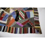 CRAZY PATCHWORK QUILT - AMERICAN a large patchwork quilt, the centre with a large selection of