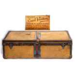 VINTAGE LOUIS VUITTON TRUNK an early 20thc large canvas and leather trimmed trunk, with wooden