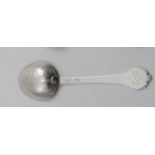A LATE CHARLES II LACE-BACK TREFID SPOON with a ribbed Rattail, scratched on the back of the