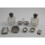 TWO SIMILAR LATE VICTORIAN MOUNTED CUT-GLASS TOILET BOTTLES with embossed globular hinged covers and