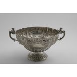 A VICTORIAN TWO-HANDLED CUP OR ROSE BOWL with repousse work decoration, cast griffon & scroll