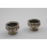 A PAIR OF EARLY 19TH CENTURY INDIAN COLONIAL SALTS of lobed circular form, struck with a maker's