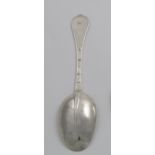 A QUEEN ANNE TREFID SPOON with a plain moulded rattail and the initial "W" on the back of the