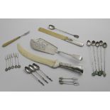 TWO EARLY 20TH CENTURY MOUNTED IVORY PAPER KNIVES A small quantity of oriental forks and spoons (