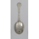 A JAMES II TREFID SPOON with a ribbed and scroll decorated rattail, the back of the terminal
