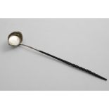 A GEORGE III WEST COUNTRY PROVINCIAL PUNCH LADLE with a twisted whalebone handle, the bowl