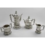 A VICTORIAN FOUR-PIECE TEA & COFFEE SERVICE in the Chinoiserie style with octagonal, pagoda-like