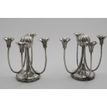 A PAIR OF EARLY 20TH CENTURY AUSTRIAN FOUR-LIGHT CANDELABRA in the Wiener Werkstatte style with