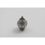 A RARE LATE 16TH / EARLY 17TH CENTURY POMANDER with a globular segmented body and a domed circular