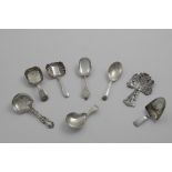 EIGHT VARIOUS ANTIQUE CADDY SPOONS by various makers, George III - Victorian; the longest one 4" (10