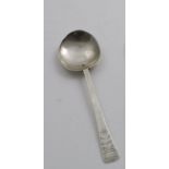 AN EARLY CHARLES II WEST COUNTRY DECORATED PURITAN SPOON with a rounded bowl and a flared stem,