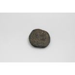 A LEAD PAPAL SEAL (OR BULLA) OF POPE INNOCENT III* dating from circa 1200 A.D.; approx.1.5" (4