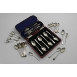 A CASED SET OF SIX ART DECO GRAPEFRUIT SPOONS Sheffield 1939, a cased Christening knife, fork and
