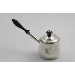 A GEORGE III BRANDY SAUCEPAN & COVER with a turned hardwood handle, crested, by Henry Chawner,