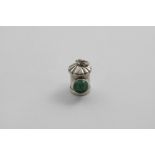 A VICTORIAN NOVELTY TAPE MEASURE in the form of a policeman's lantern with green bullseye lens,