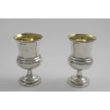A PAIR OF GEORGE III NORTH COUNTRY PROVINCIAL WINE GOBLETS with campana-shaped bowls and gilt